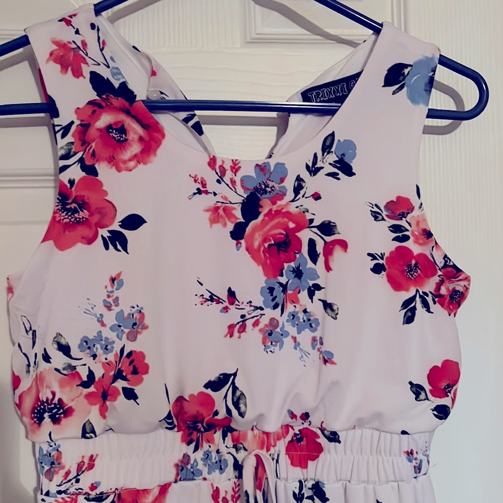 Girl white flowered dress.